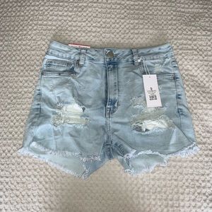 High waisted, distressed denim shorts